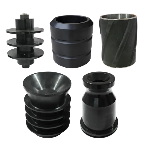 Various downhole tool rubber components against a white background